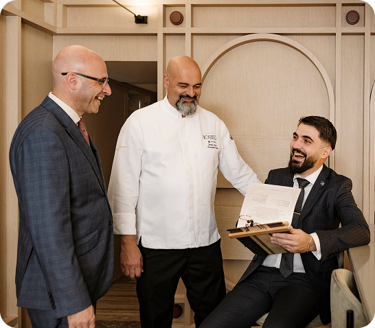 Chef Victor Borg leading a team at Rosselli AX Privilege restaurant